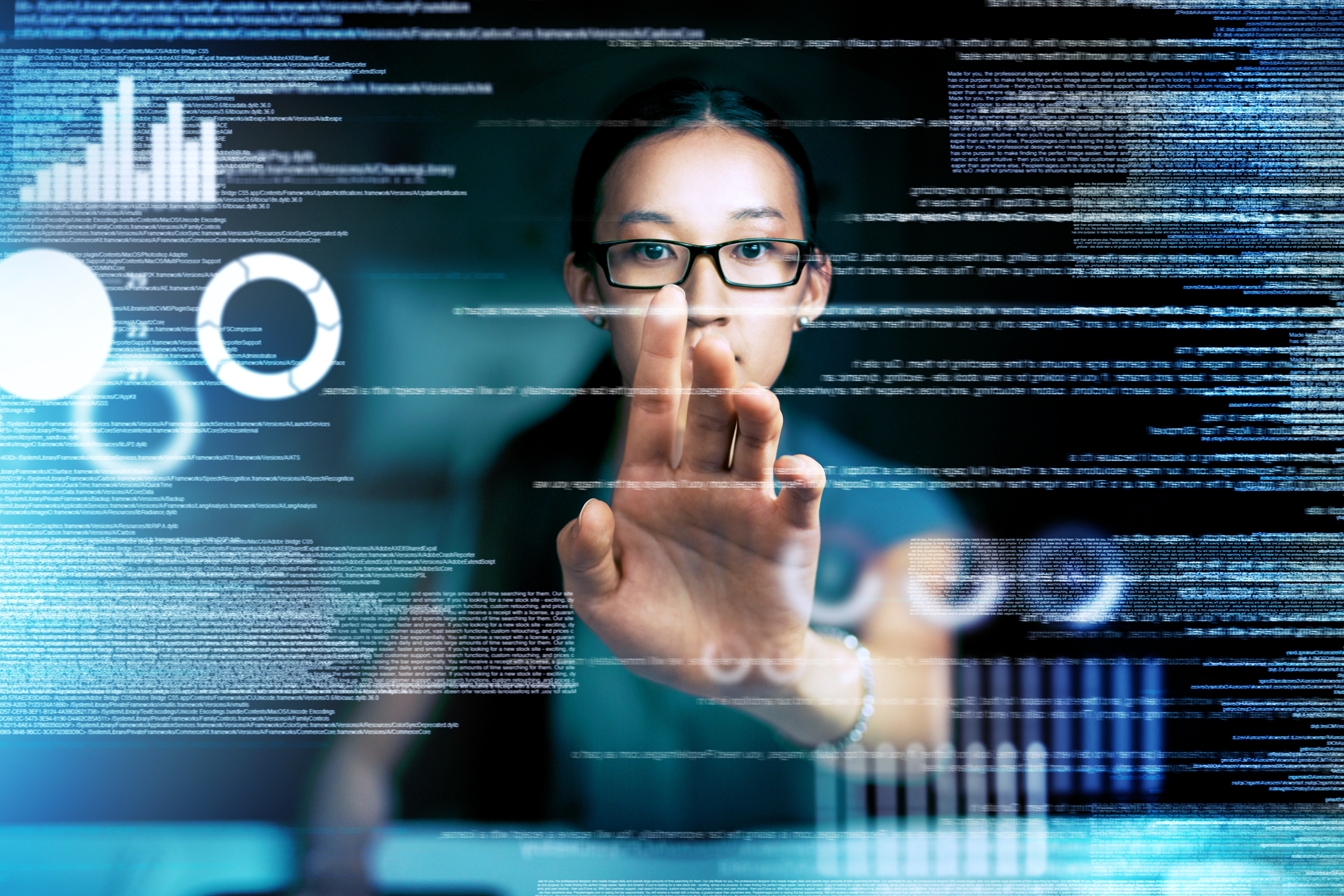 A cybersecurity professional analyzing data protection strategies on a digital interface, ensuring company data security and preventing cyber threats.